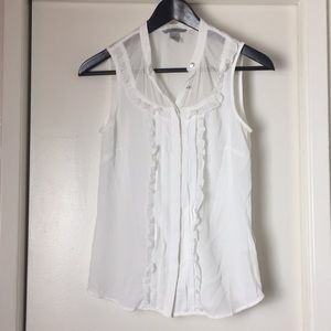White ruffled blouse. Adorable detail